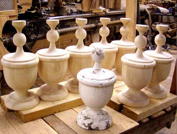 Group of custom unfinished wooden finials designed to match a customer sample.